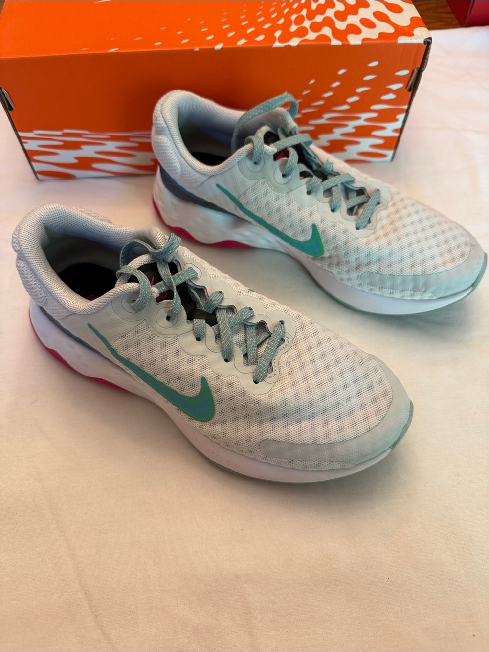 Nike Women's White and Teal Running Sneakers with Pink Accent